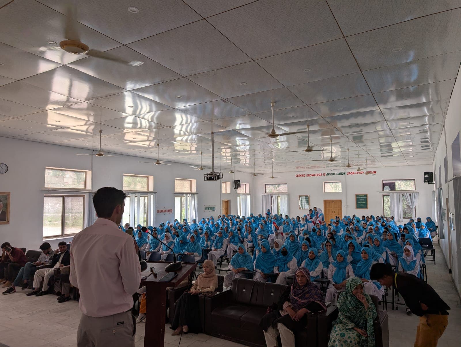 Students attending a university orientation session